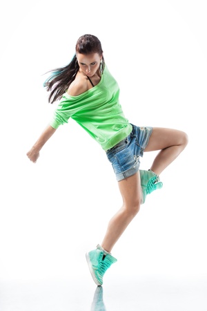 modern dancer poses in front of the studio backgroundの写真素材