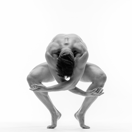 young and beautiful modern style dancer posingの写真素材