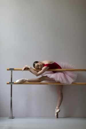 Beuatiful ballerina training in the classの写真素材