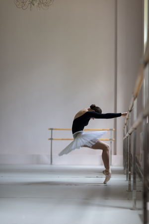 Beuatiful ballerina training in the classの写真素材