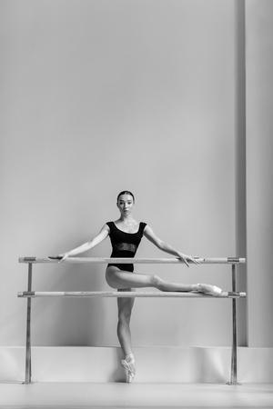 Beautiful ballerina training in the classの写真素材