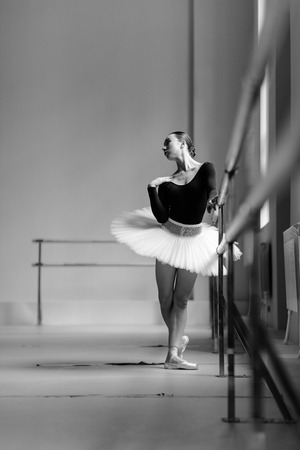 Beautiful ballerina training in the classの写真素材