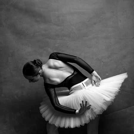 one ballerina dancing on a retro backgroundの写真素材