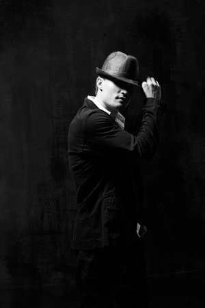 modern style dancer posing on studio backgroundの写真素材