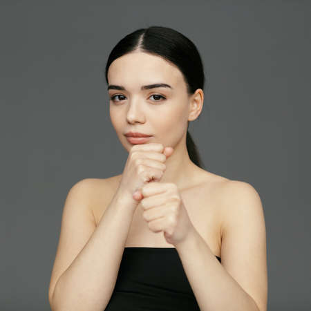 Young beautiful woman face close-upの写真素材