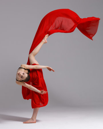 Young beautiful cool looking girl posing in studioの写真素材