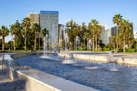 Fountain on boulevard with palm trees and skyscrapers. New boulevard in Batumi, Georgia.の写真素材
