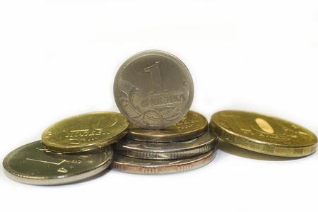 Iron Russian coins on a white background headed with 1 kopeck.の写真素材