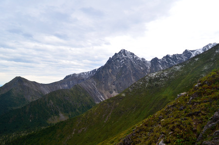 The Siberian high mountains of Eastern Sayan. Mountains are located in South-East Siberia.の写真素材