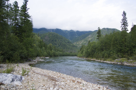 Rough mountain river Shumak. This river flows deep in the Sayan mountainsの写真素材