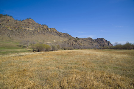 Beautiful autumn landscape of nature of Buryatia. The majestic mountains and the steppe.の写真素材