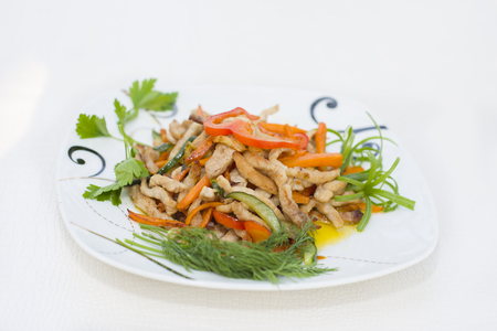 Rope pork fried with vegetables. Very tasty and fresh meat.の写真素材