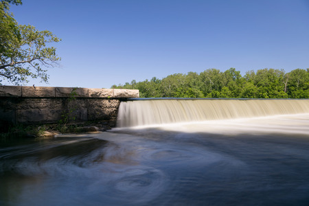 Water fall over dam on the Potomac river in near Washington DCの写真素材
