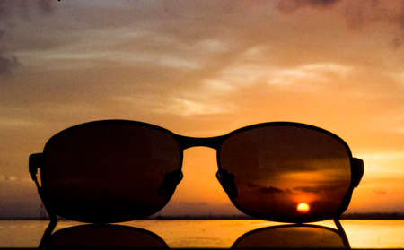 Sun set captures through a sun glassの写真素材