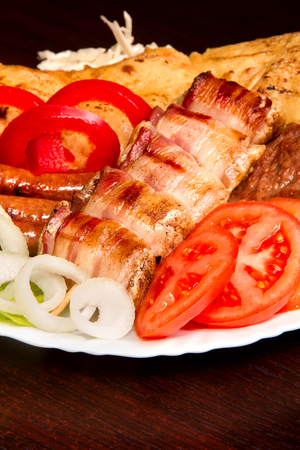 Assorted delicious grilled meat with vegetable.の写真素材