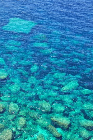Rocks at the bottom of the water  from above in a transparent sea and  turquoiseの写真素材