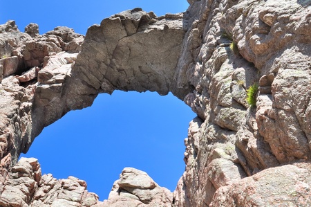 Blue sky through an opening in the rock