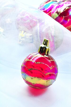 Christmas balls arranged in the tulleの写真素材