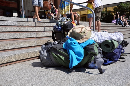 traveler's bag lying on the back and come from a station