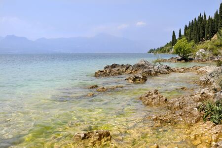 reefs of Lake Garda in transparent waterの写真素材