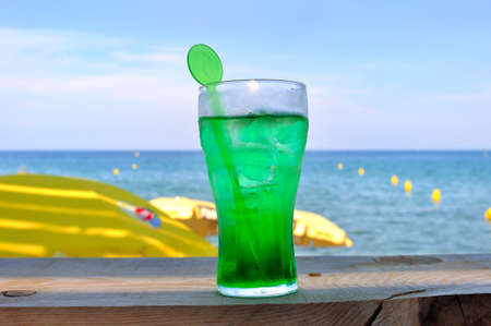 glass of fresh mint  water beachfrontの写真素材
