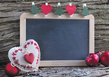 Slate for Christmas wishes in a rustic chrsitmas decorの写真素材