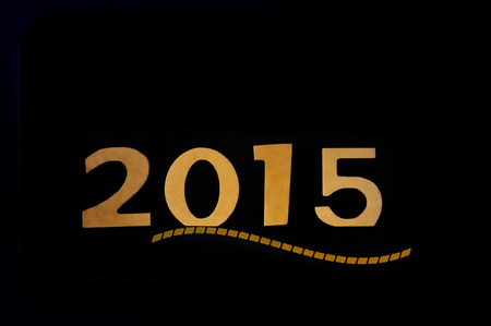 greeting card with golden 2015  on a black backgroundの写真素材