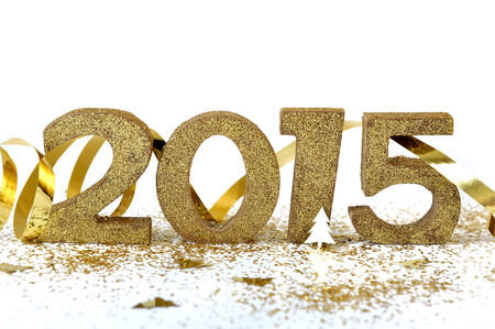 2015 figures on gold glitter and white backgroundの写真素材