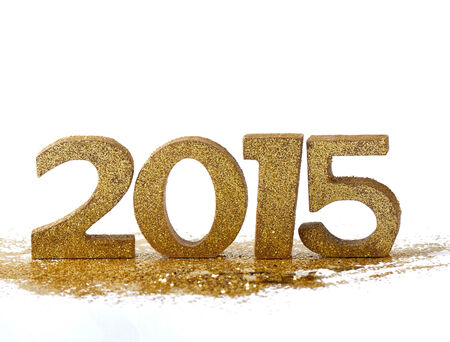 2015 figures on gold glitter and white backgroundの写真素材