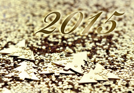 2015 on golden confettis and glitters backgroundの写真素材