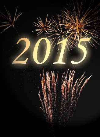 new year 2015 on a fireworks with gold glitterの写真素材