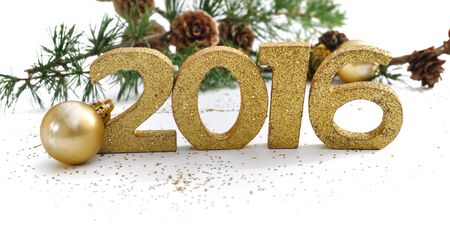 2016 golden digits with fir branches on a white backgroundの写真素材