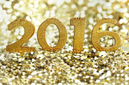 golden figures 2016 on shiny bokeh backgroundの写真素材