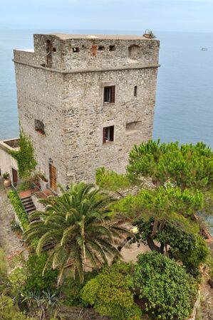 genovese tower with garden on seafrontの写真素材