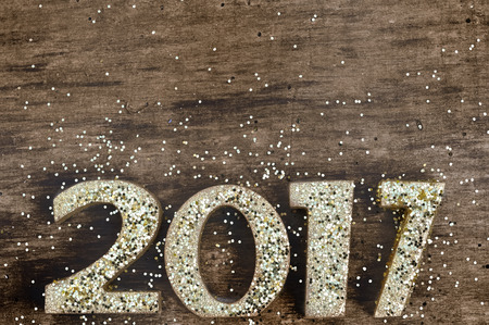 2017 on wooden panel  with golden figures on glitters