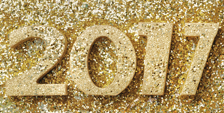 2017 golden figures on golden glitters backgroundの写真素材