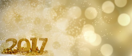 golden 2017 figures on bright bokeh background