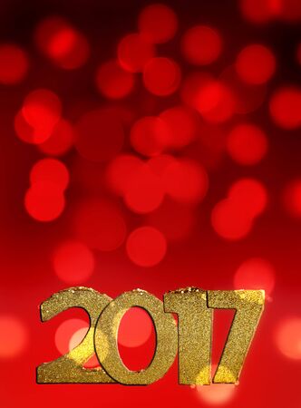 golden figures 2017 on red bokeh backgroundの写真素材