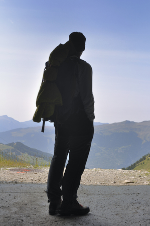 silhouette of a hiker looking landscapeの写真素材