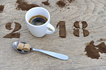 cup of coffee and 2018 written with ground coffeeの写真素材