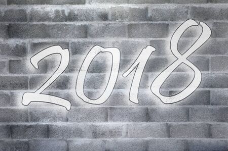 2018 written on cinderblock wall