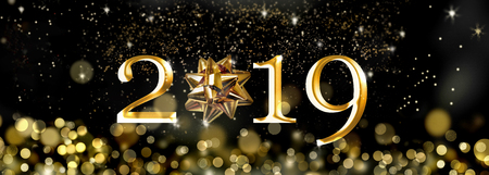 2019 new year next to an abstract christmas tree in the blur lights backgroundの写真素材