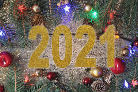 2021 golden figures textures with glitters on Christmas ornament backgroundの写真素材