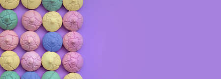 panoramic view on colorful meringues arranged in the left with copy pace in the right on purple backgroundの写真素材