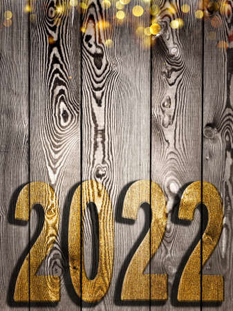 2022 golden year written on rustic plank backgroundの写真素材