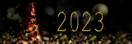 2023 written on abstract night next to a christmas tree in panoramic size