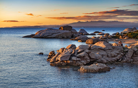 beautiful rocky beach at sunset in the granite coast of Palau in Sardinia-Italyの写真素材
