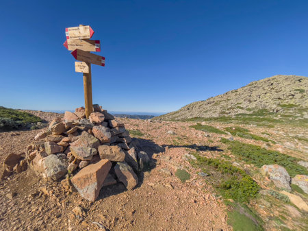 direction sign of hiking path and stand up in stones in mountain in national park Gennargentu in Sardiniaの写真素材