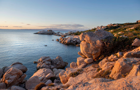 beautiful view at the sunset on the granitic coast on the island of Sardinia Italy with a little beachの写真素材
