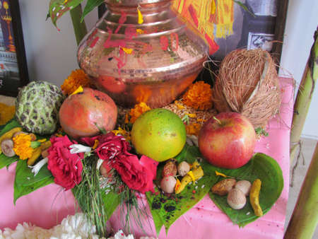 Fruits and other ingredients kept as offerings before prayer as per Hindu ritualの写真素材